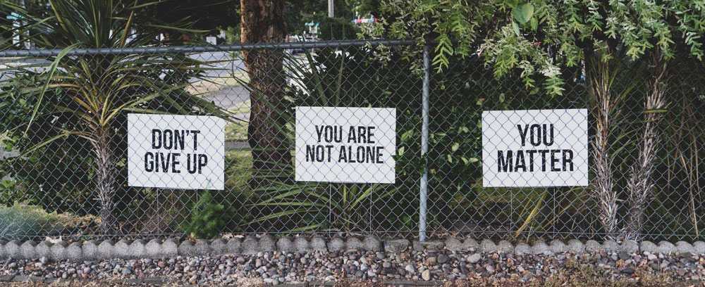 positive messages on fence, SUD Recovery
