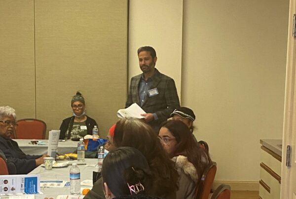 Carlos facilitating at Health Equity Event