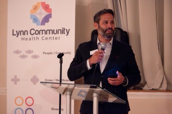 Carlos speaking at LCHC event