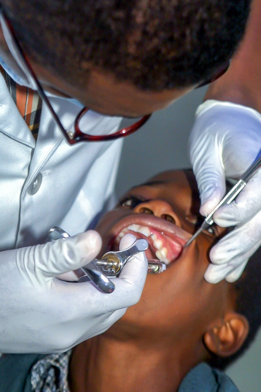 Dental Services 2 LCHC dentist providing care to child in Lynn MA
