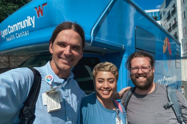 Kelly Jennifer Patrick LCHS's medical outreach program van with staff. MOP Mobile Unit Van