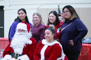 Staff and Mr and Mrs Clause Small