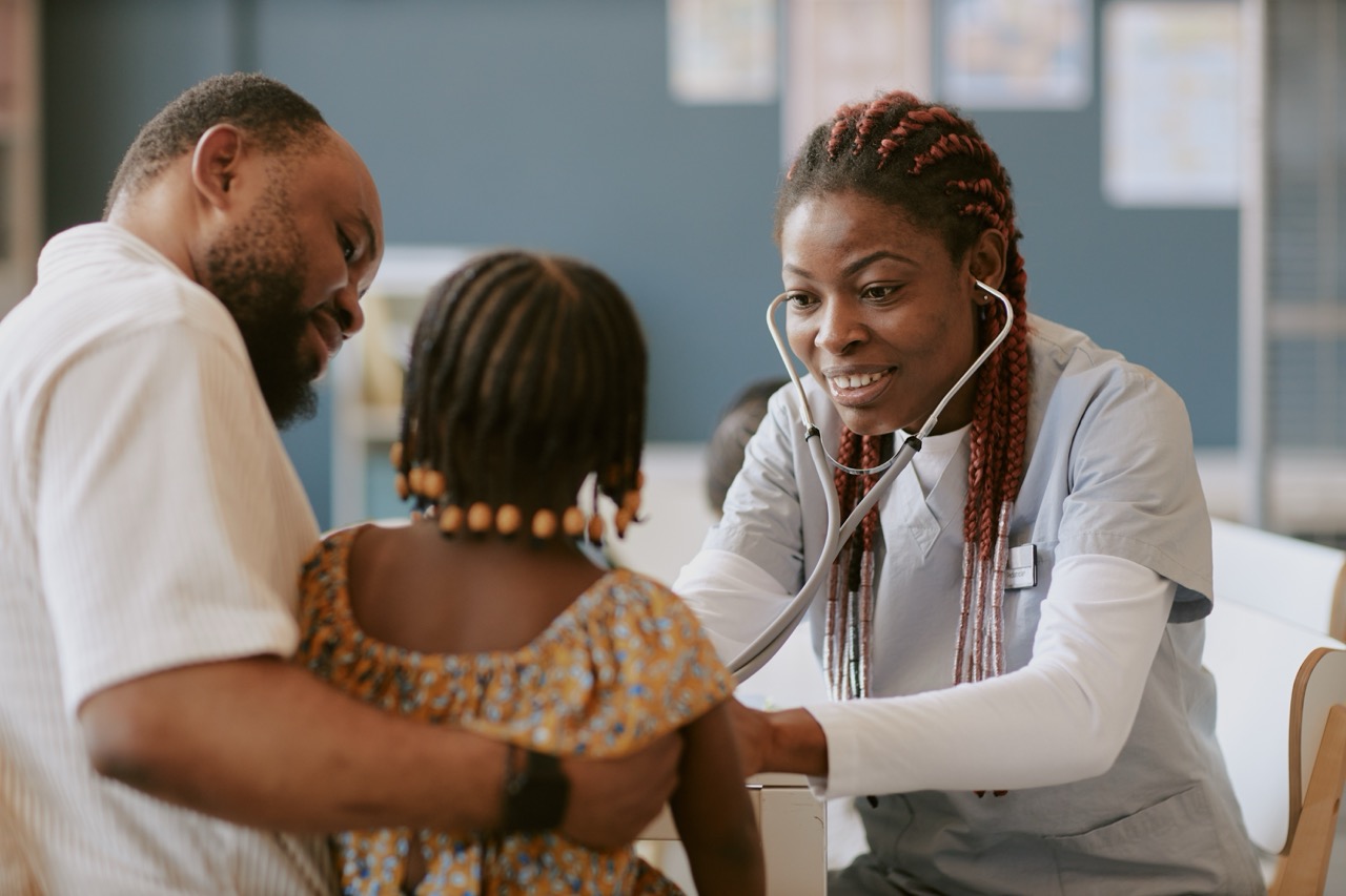 Primary Care 3 nurse checking child with stethoscope