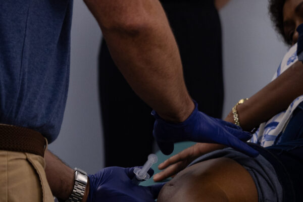 Doctor working on persons leg