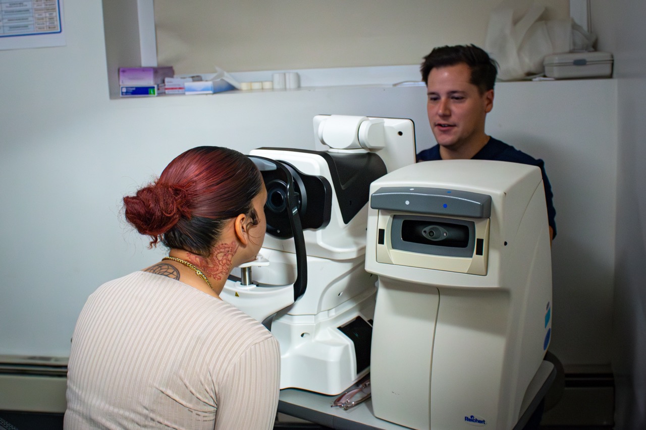 Eye Care Careers 9 Optometrist with patient at Lynn Community Health Center