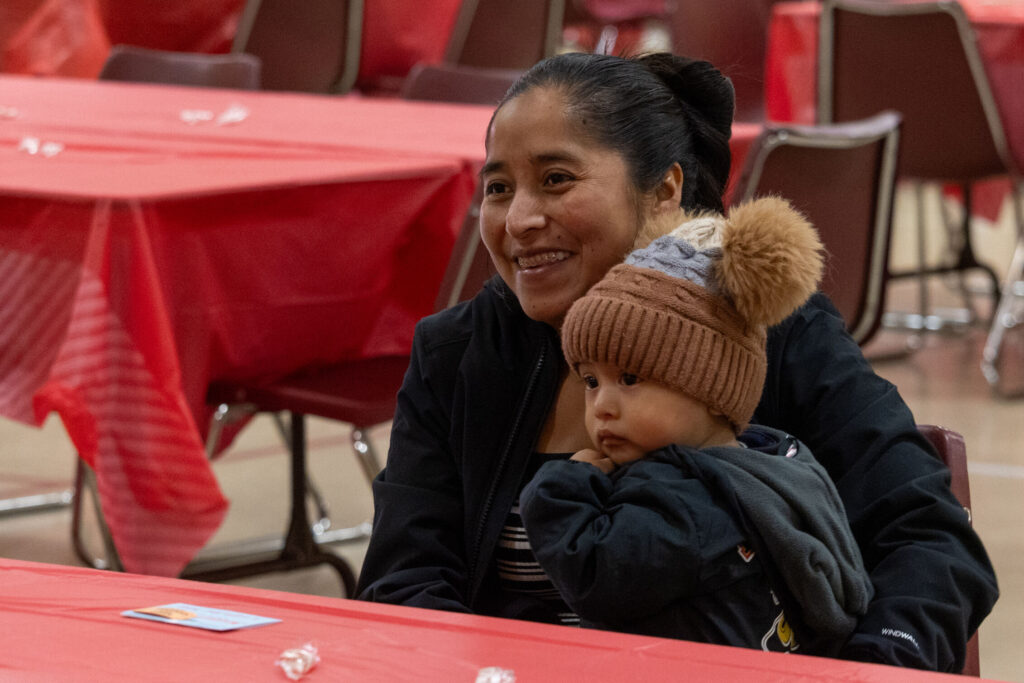 BFX_1_optimized_1000 Mother holding baby and smiling