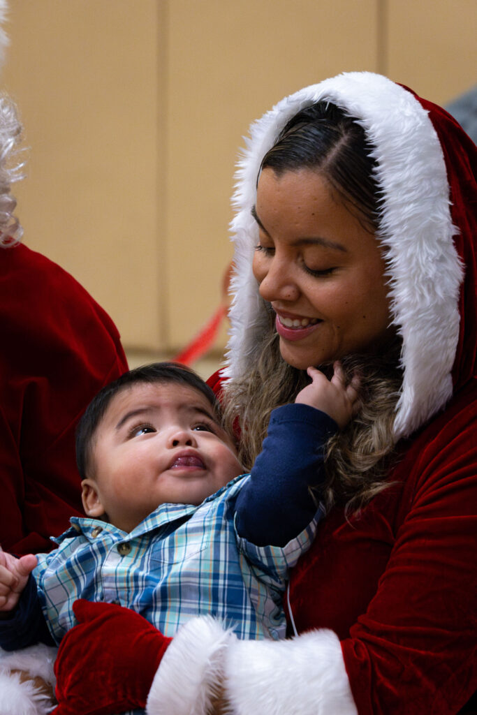 BFX_Mrs_Clause_optimized_1000 Mrs. Claus and Baby smiling