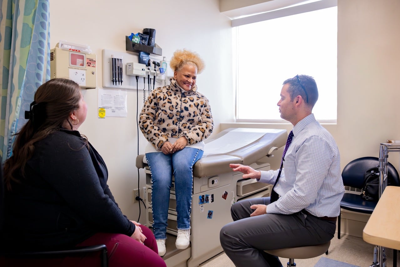 Programs & Services 5 LCHC doctor with patient